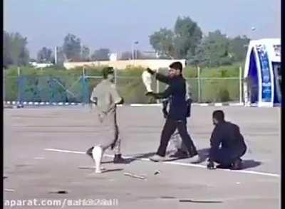 Iranian soldiers failing miserably in a martial arts demonstration in front of top Iranian generals & military officials during a ceremony.