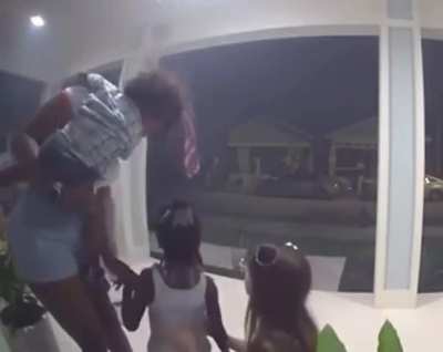 Asshole in a pickup truck throws a firecracker at a family on their porch