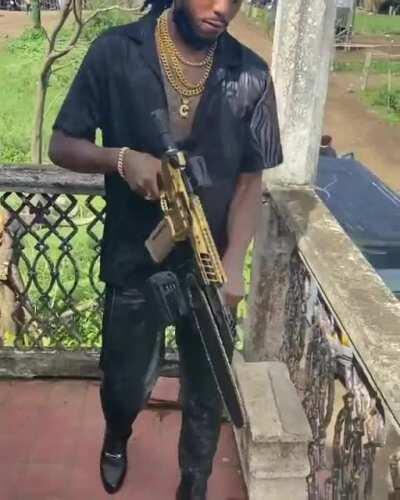 quavo's gun-chainsaw thingy...