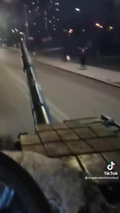 Ukrainian Tanks Driving Down Highway Cheered By Ukrainian Citizens
