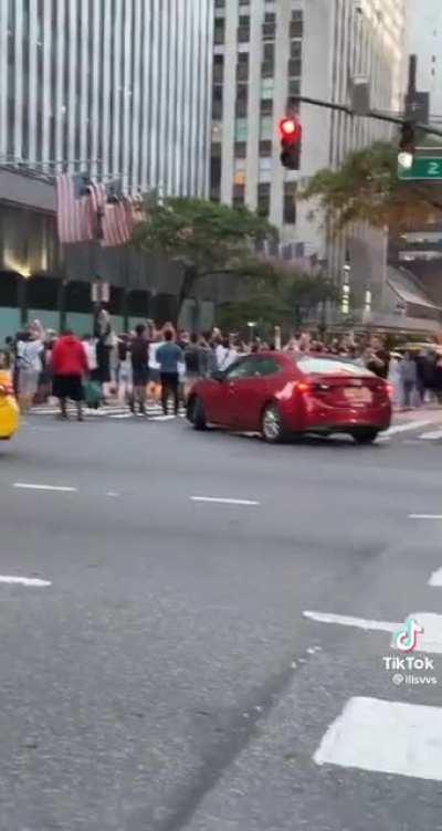 people in NYC see a sunset.