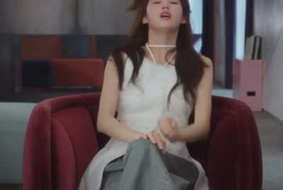 stretching on a chair.