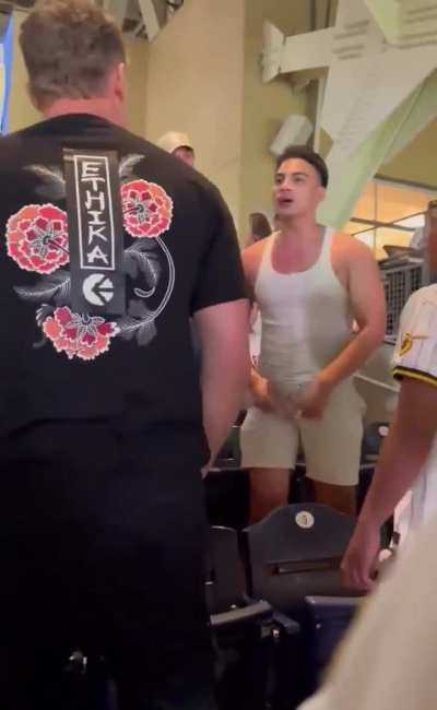 Tough guy blocks punches using his face  in a public fight