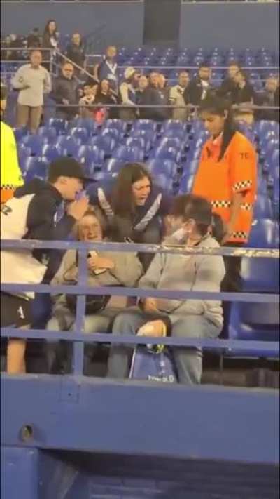 Grown woman steals a football shirt from a boy (Argentina). 