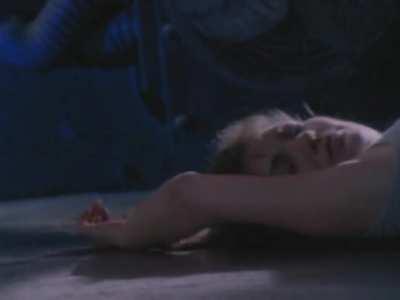 Brinke Stevens gets abducted in her sleep in Hybrids (1997)
