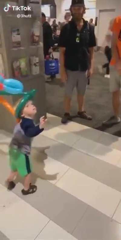 Trying to catch his toy till now