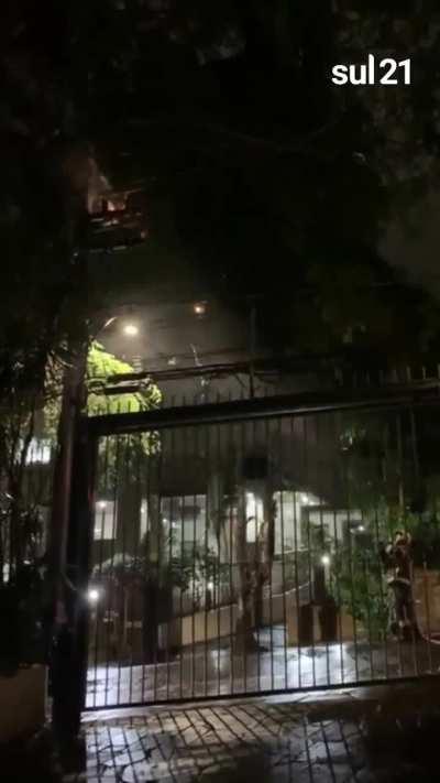Porto Alegre, Brazil : Firefighter Using Water To Extinguish A Fire On Electric Pole Ends Up With An Explosion exact date is unknown but this incident is almost 8 days old (sorry before i upload the wrong video)
