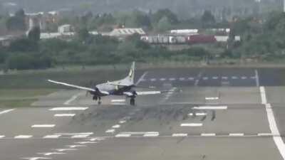 Aircraft veers off runway during crosswind landing at Birmingham Airport