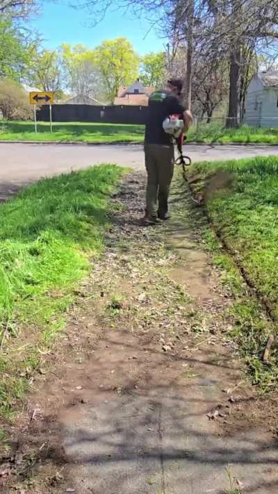 This lawn care guy cleans up this overgrown sidewalk for free

The neighbors are baffled and grateful why anyone would do this