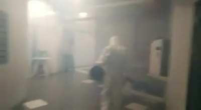 Frontliners disinfecting the apartment in KB after alleged rumours about a tenant tested positive for Covid-19