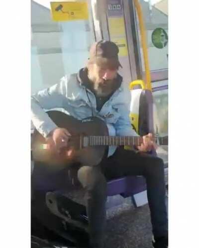 Irish busker singing you've got a friend in me to an autistic child on the Luas (Tram) ♥