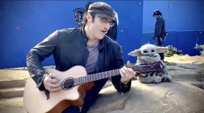 Robert Rodriguez hanging out with Baby Yoda