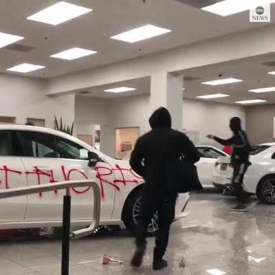 Mercedes dealership vandalized during protest