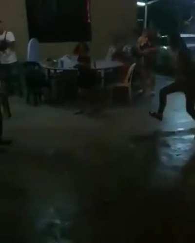 Idiot holds a firework in hand