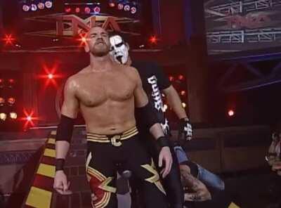 Sting catches Christian Cage by surprise