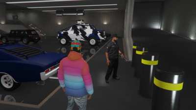 Does anybody know what this NC security guard is looking out for *with a flashlight* in a well-lit garage?