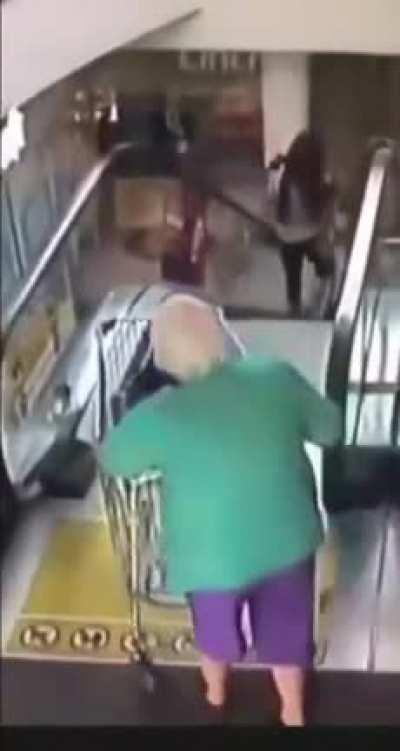 Grandma using an escalator