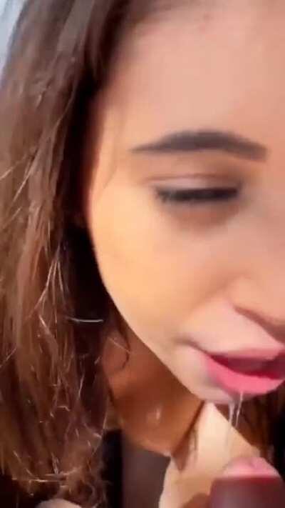 Love the way this green-eyed beauty sucks cock, slaps her face with the dick, and takes the facial