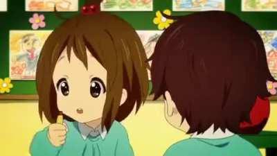 Yui thinks crayon looks tasty