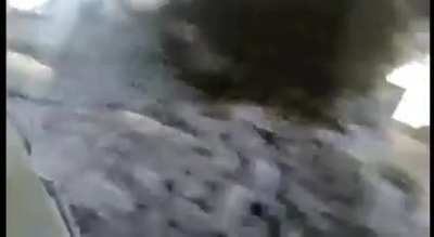 Helmet cam of Turkish soldiers detonating an anti-personnel mine/tripwire while clearing a destroyed building, Southeastern Region, circa 2014.