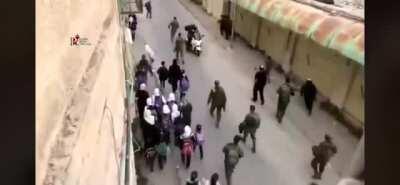 Continuous attacks on Palestinian Education by isreali occupation forces & squatters.. harassing Palestinian school children. All shops closed on Shuhada Street in occupied city of Hebron after a few iseeali racist radicals moved in the area.. kicking