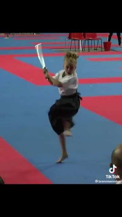 Girl winning martial arts championship. The battle cry at the end..!