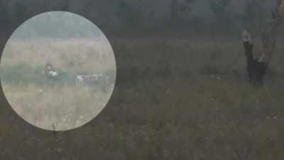 RU pov: Russian snipers hit a Ukrainian soldier in the head, blowing off his helmet.