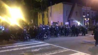 Protesters in Washington DC chant “Let us leave! Let us leave!” as police box them in