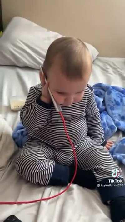 To capture a cute moment with the baby