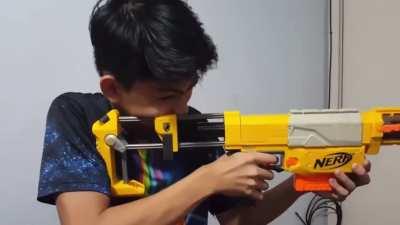 Realistic recoil on nerf rifle