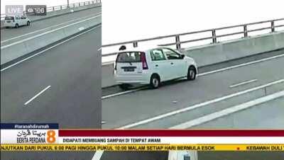 CCTV footage of an irresponsible driver dumping rubbish off Temburong Bridge. This is why we can’t have nice things.