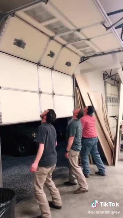 Garage door drink holder