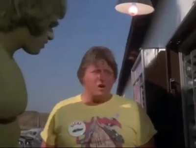 Why is he standing in front of the machine like it's a urinal