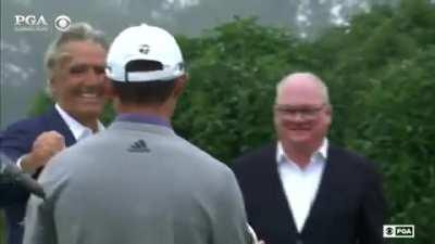 Collin Morikawa lifts the US PGA Championship trophy