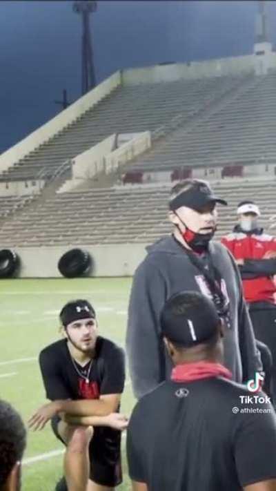 Two football players who pay their own tuition by working are given the same opportunity as their peers