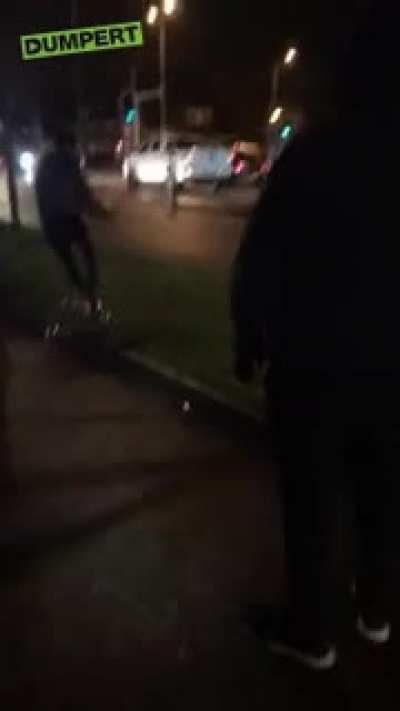 Guy throws a firework shell