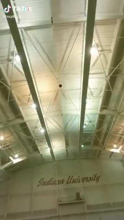 Nurk from the Drone Racing League knocking down footballs with a drone