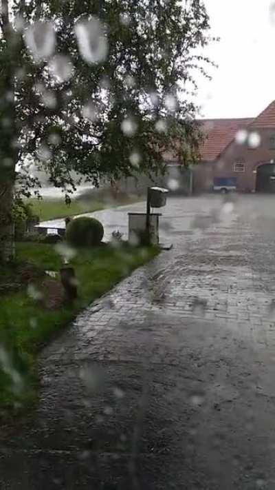 Northern Germany, 15th April 2021, inside a VW Polo on a ride to Oldenburg (Oldb.). The rain was very heavy so we had to take a short break.