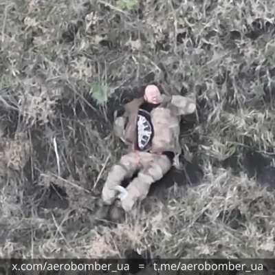 A russian invader was hit by a drone-dropped grenade and then proceeded to stab a knife into his chest. Video by the Ukrainian 30th Mechanized Brigade 