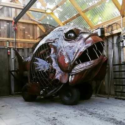 This stunning giant fish is a kinetic sculpture made by the artist Maarten van halderen, based in Raamsdonk, the Netherlands.