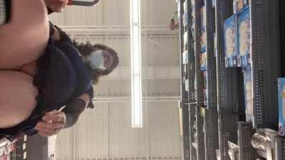 Brianna does an upskirt and squat over her camera.