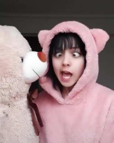 she must really like that bear.