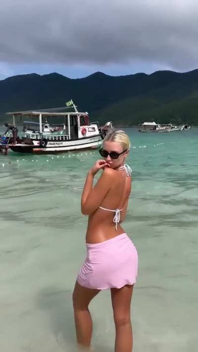 Polina Malinovskaya - Quick Dip at the Beach in a Pink and White Plaid Bikini Under a Sheer Mini Skirt (IG Story Clip)