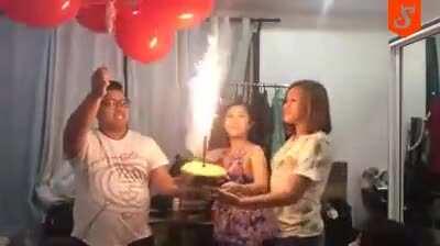Helium and a cake with a firework on it, what could go wrong..