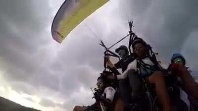 Just dudes hanging out over the beach