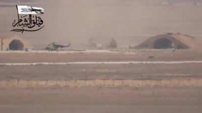 Opposition ATGM team engages an SAA helicopter as it lands at Abu Al-Duhur Military Air Base - 9/8/2014