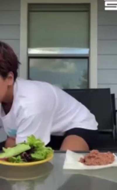 She's not forcing the dog