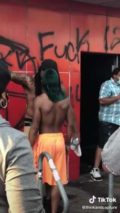 BLM advocate stops and ridicules a looter that tried to loot. Be more like this man.