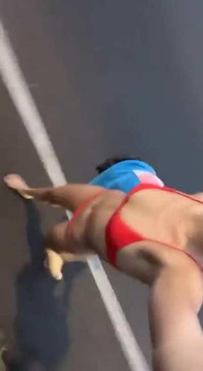 Lily Chee walking down the street