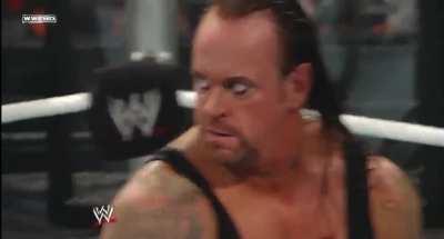 Chris Jericho contemplates entering the match until The Undertaker sits up and he changes his mind - Elimination Chamber 2010